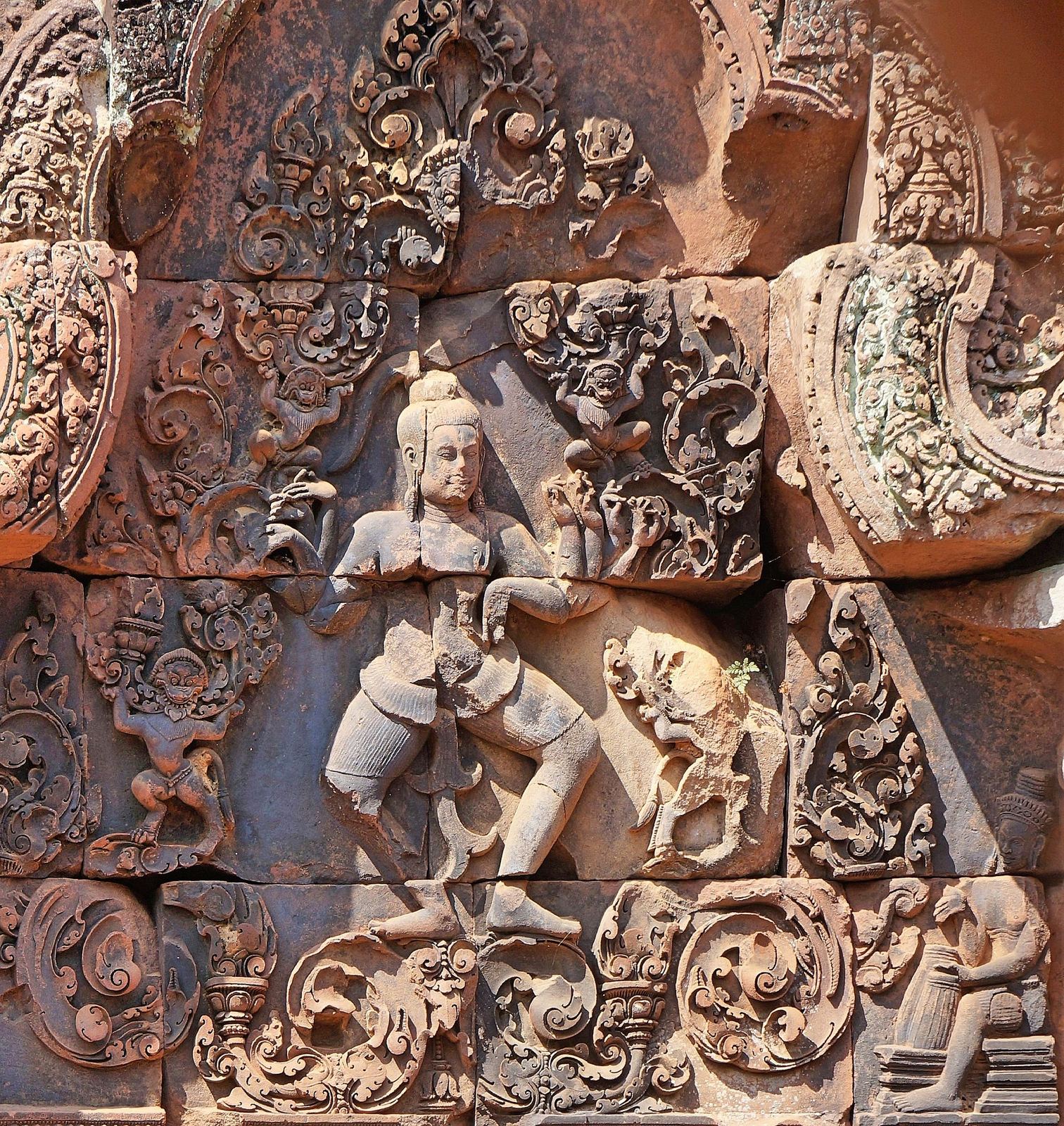 Intricate pink sandstone carvings at Banteay Srei